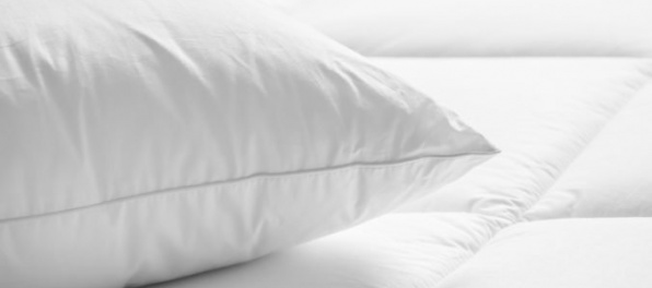 „Obchodník“ Koloman ponúkal periny 62-ročnej žene a obral ju o peniaze