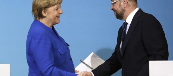 Merkelová, Seehofer a Schulz začali rokovať o vytvorení veľkej koalície